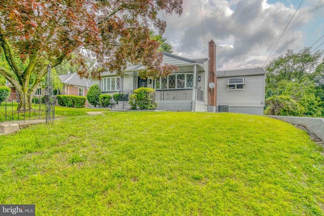611 Parkview Blvd, Lansdowne, PA 19050 - view of front of property with a front lawn and a chimney