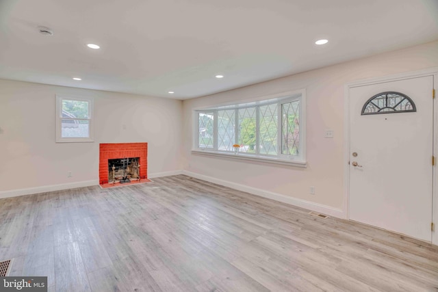 611 Parkview Blvd, Lansdowne, PA 19050 - unfurnished living room featuring a fireplace, light wood-style flooring, recessed lighting, and baseboards