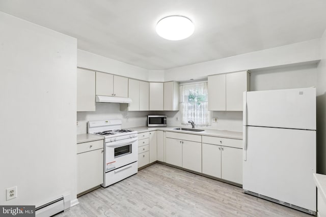 3 Karok Ln, Browns Mills, NJ 08015 - kitchen featuring white appliances, under cabinet range hood, a baseboard radiator, and light countertops