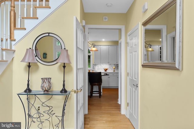 1597 Woodfield Dr, Bethlehem, PA 18015 - hall featuring light wood-style floors and stairs