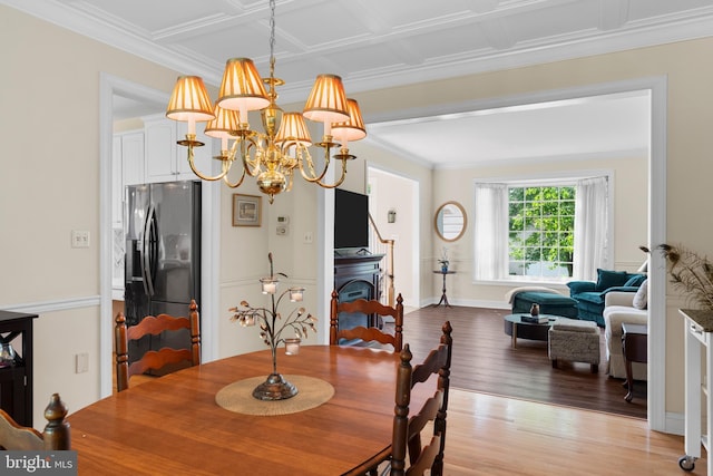 1597 Woodfield Dr, Bethlehem, PA 18015 - dining area with light wood-style floors, a chandelier, and ornamental molding