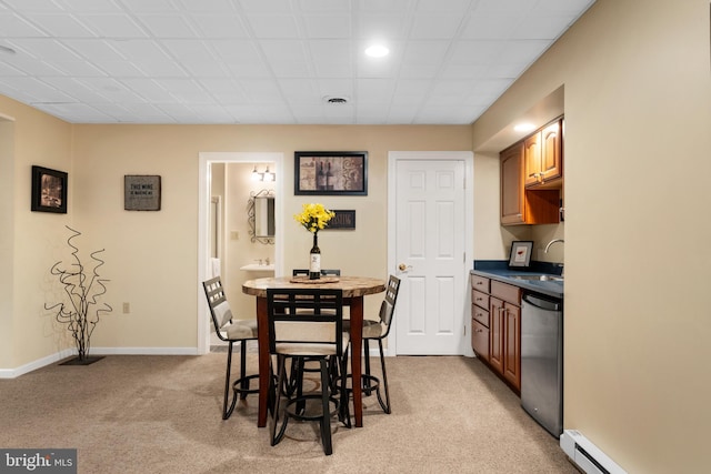 1597 Woodfield Dr, Bethlehem, PA 18015 - dining room featuring light carpet, a baseboard heating unit, and baseboards