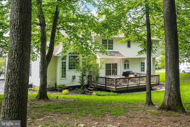 1597 Woodfield Dr, Bethlehem, PA 18015 - rear view of house featuring a wooden deck and a lawn