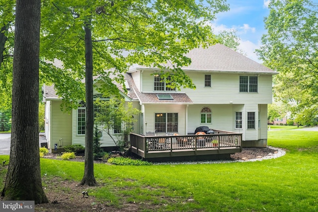 1597 Woodfield Dr, Bethlehem, PA 18015 - back of house featuring a wooden deck, a yard, and roof with shingles