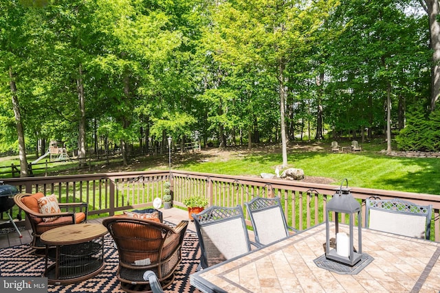 1597 Woodfield Dr, Bethlehem, PA 18015 - wooden terrace with outdoor dining space and view of wooded area