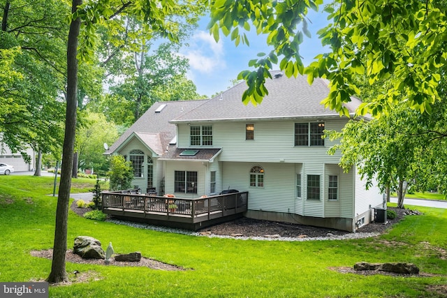 1597 Woodfield Dr, Bethlehem, PA 18015 - rear view of property with a wooden deck, a lawn, central AC, and a shingled roof