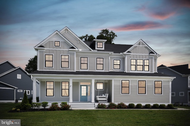 24153 Heartleaf Rd, Frankford, DE 19945 - modern inspired farmhouse with board and batten siding, a porch, and a lawn