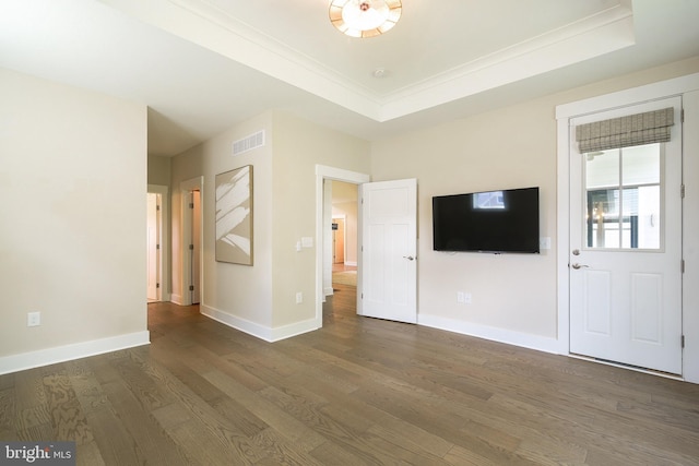 24153 Heartleaf Rd, Frankford, DE 19945 - unfurnished living room featuring wood finished floors, baseboards, ornamental molding, and a tray ceiling