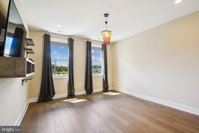 24153 Heartleaf Rd, Frankford, DE 19945 - spare room with wood finished floors, baseboards, and recessed lighting