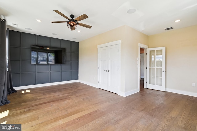 24153 Heartleaf Rd, Frankford, DE 19945 - spare room featuring a ceiling fan, light wood-type flooring, baseboards, recessed lighting, and french doors