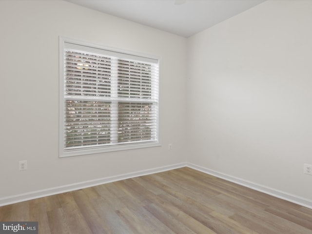 43167 Loudoun Reserve Dr, Ashburn, VA 20148 - unfurnished room with wood finished floors and baseboards