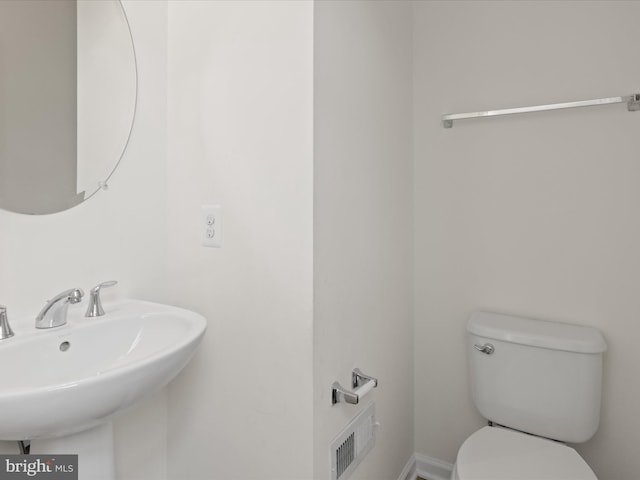 43167 Loudoun Reserve Dr, Ashburn, VA 20148 - bathroom with toilet and a sink