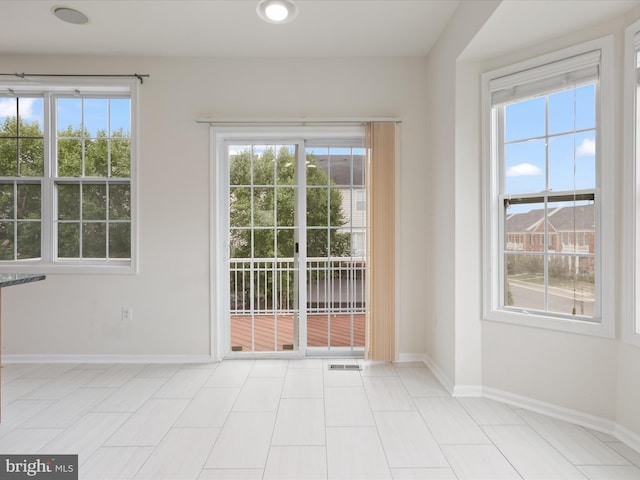 43167 Loudoun Reserve Dr, Ashburn, VA 20148 - spare room with healthy amount of natural light and baseboards