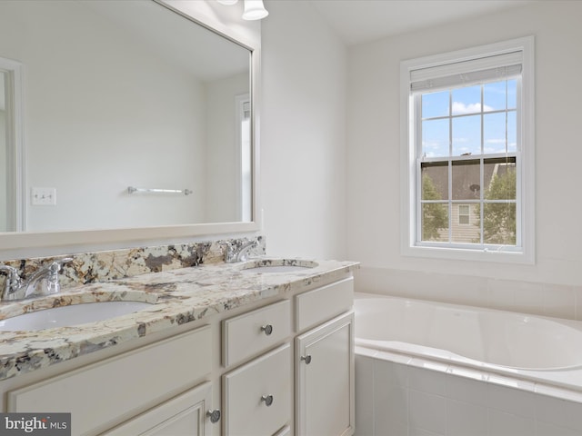 43167 Loudoun Reserve Dr, Ashburn, VA 20148 - full bathroom featuring double vanity and a garden tub