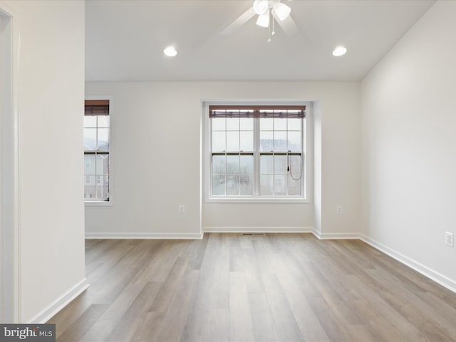 43167 Loudoun Reserve Dr, Ashburn, VA 20148 - empty room featuring plenty of natural light, a ceiling fan, wood finished floors, and recessed lighting