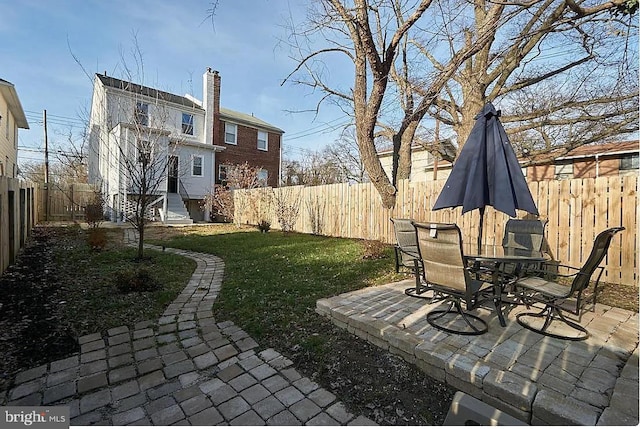 2802 Bruce Pl SE, Washington, DC 20020 - view of yard featuring a patio and outdoor dining space