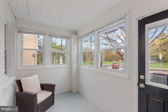2802 Bruce Pl SE, Washington, DC 20020 - unfurnished sunroom featuring finished concrete floors