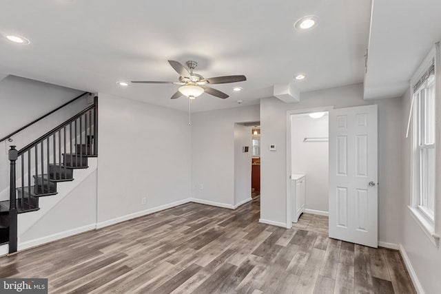 2802 Bruce Pl SE, Washington, DC 20020 - below grade area with ceiling fan, wood finished floors, baseboards, stairs, and recessed lighting