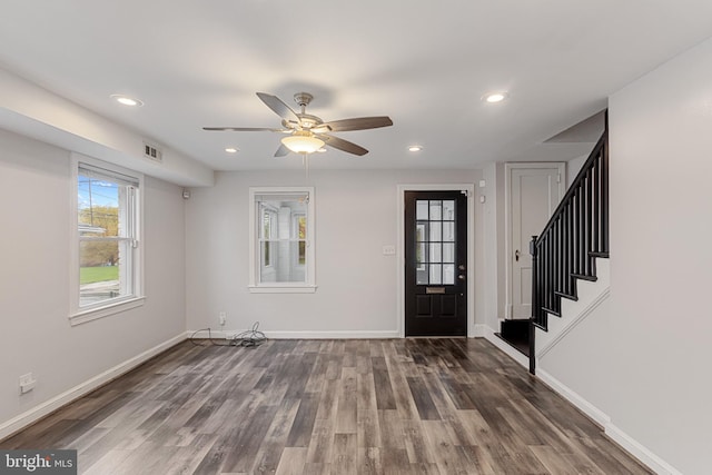 2802 Bruce Pl SE, Washington, DC 20020 - entryway featuring stairs, wood finished floors, baseboards, ceiling fan, and recessed lighting