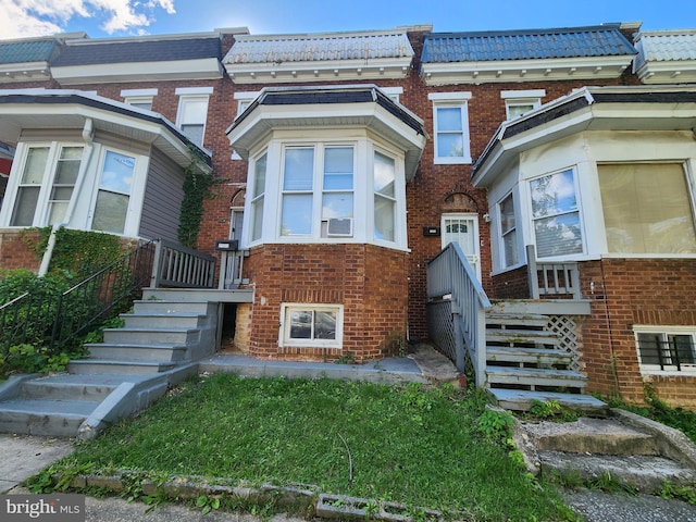 2523 Garrett Ave, Baltimore, MD 21218 - property entrance with brick siding and cooling unit