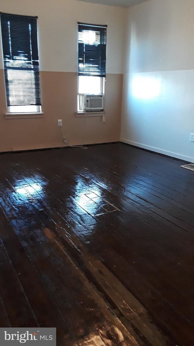 2523 Garrett Ave, Baltimore, MD 21218 - empty room featuring wood-type flooring and cooling unit