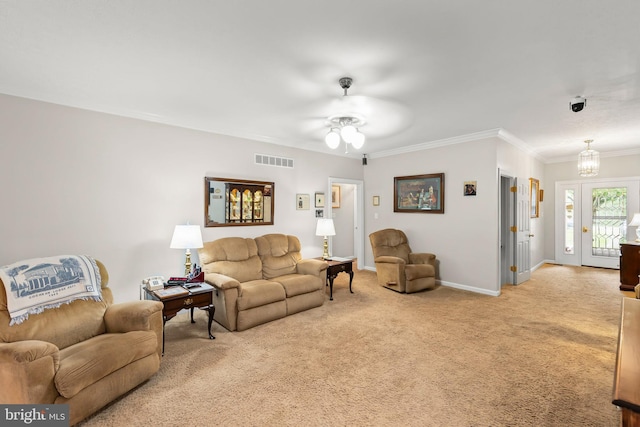 1419 Ramseur Ln, Winchester, VA 22601 - living room with light colored carpet, crown molding, ceiling fan, baseboards, and a chandelier
