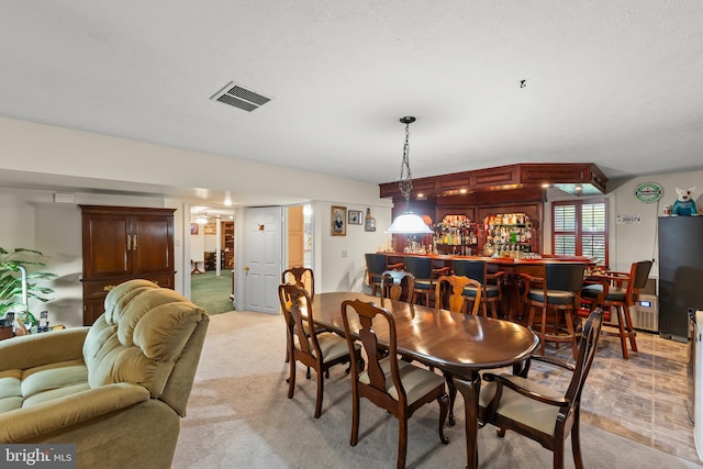 1419 Ramseur Ln, Winchester, VA 22601 - dining area featuring a bar and light colored carpet