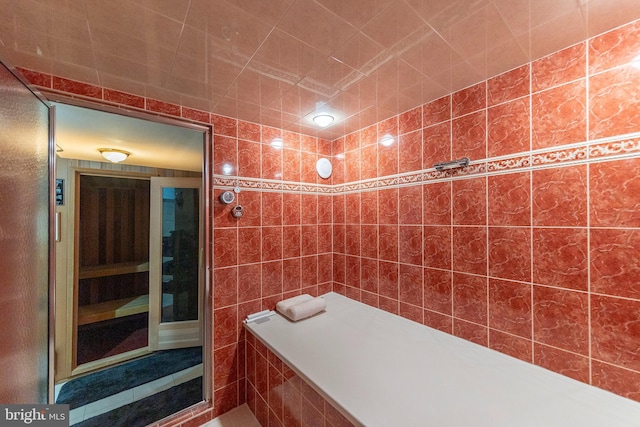 1419 Ramseur Ln, Winchester, VA 22601 - full bathroom with a sauna / steam room, tile walls, and a tile shower