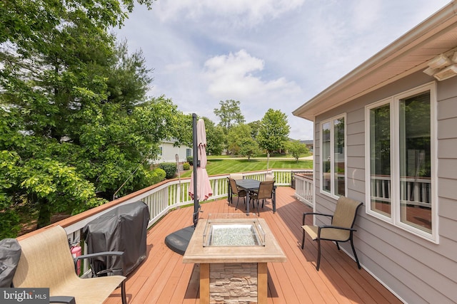 1419 Ramseur Ln, Winchester, VA 22601 - deck with outdoor dining area and an outdoor fire pit