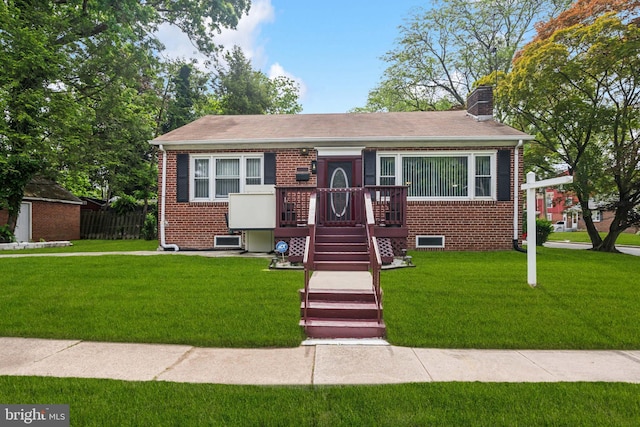 232 Columbia Ave, Trenton, NJ 08618 - bungalow-style house featuring brick siding, a chimney, a wooden deck, and roof with shingles