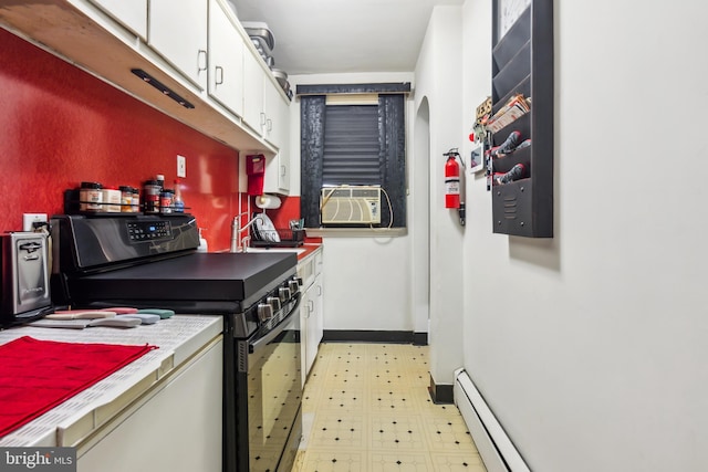 232 Columbia Ave, Trenton, NJ 08618 - washroom with light flooring, a baseboard radiator, arched walkways, cooling unit, and cabinet space