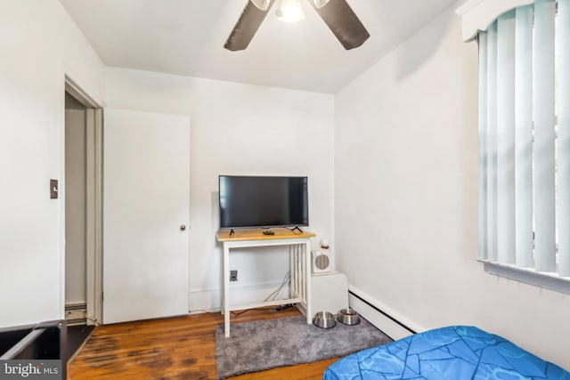 232 Columbia Ave, Trenton, NJ 08618 - bedroom featuring baseboard heating, wood finished floors, and ceiling fan