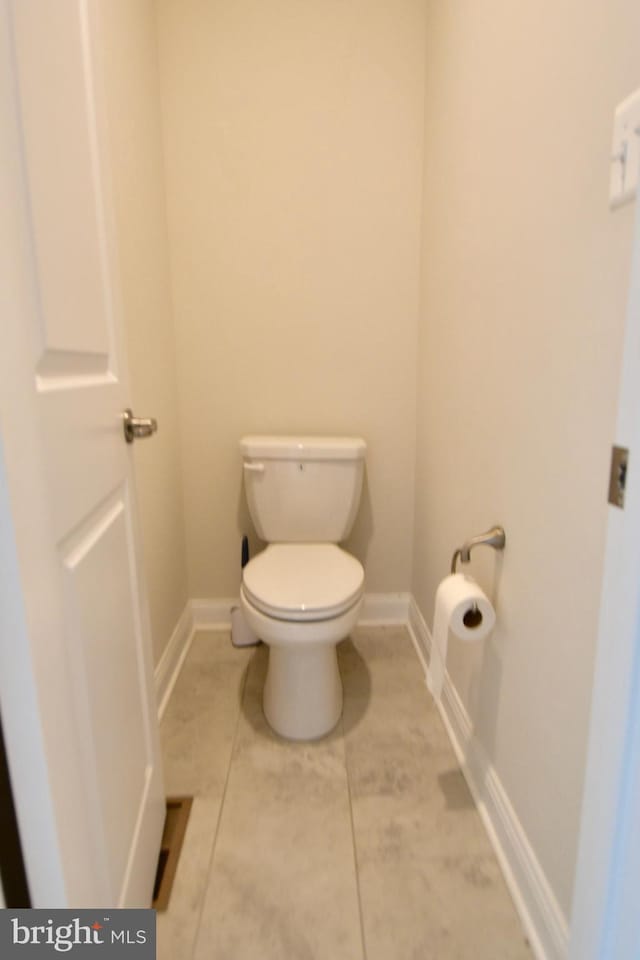 35258 Wright Way, Millsboro, DE 19966 - bathroom featuring toilet, baseboards, and tile patterned floors
