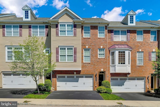 124 Mary Ambler Way, Ambler, PA 19002 - multi unit property with a garage, driveway, and brick siding