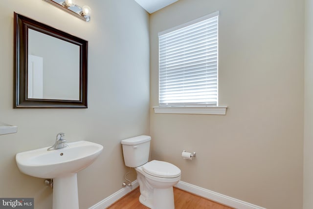 124 Mary Ambler Way, Ambler, PA 19002 - bathroom featuring baseboards, wood finished floors, and toilet