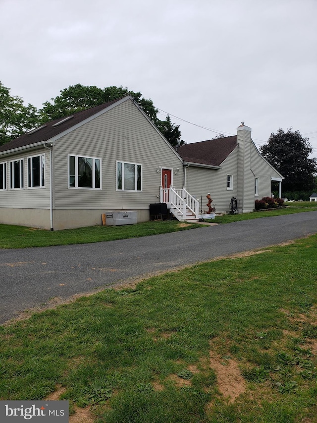 4010 Conowingo Rd, Darlington, MD 21034 - view of front of home with a front lawn and a chimney