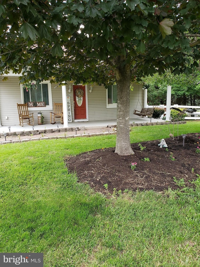 4010 Conowingo Rd, Darlington, MD 21034 - view of front of house with covered porch and a front lawn