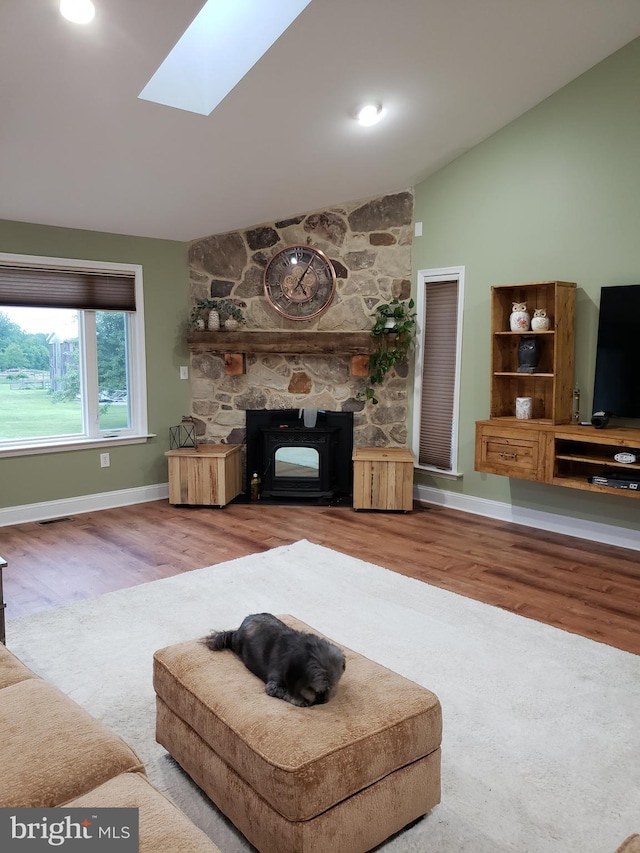 4010 Conowingo Rd, Darlington, MD 21034 - living area with lofted ceiling, wood finished floors, baseboards, and a skylight