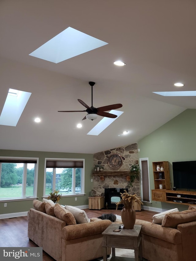 4010 Conowingo Rd, Darlington, MD 21034 - living area with a skylight, wood finished floors, vaulted ceiling, plenty of natural light, and recessed lighting