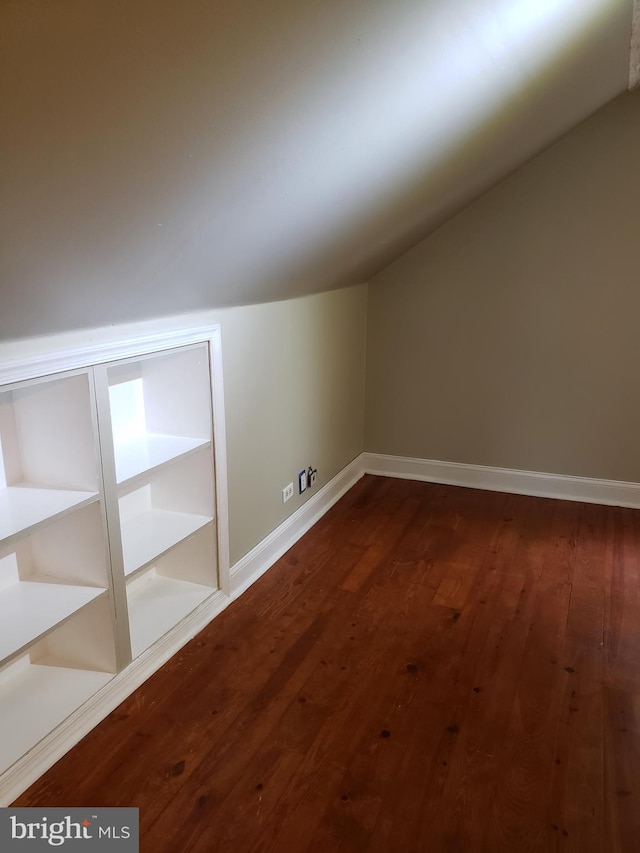 4010 Conowingo Rd, Darlington, MD 21034 - bonus room featuring dark wood-style flooring, vaulted ceiling, and baseboards