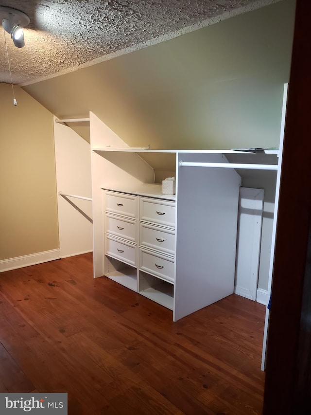 4010 Conowingo Rd, Darlington, MD 21034 - walk in closet featuring dark wood-type flooring and vaulted ceiling