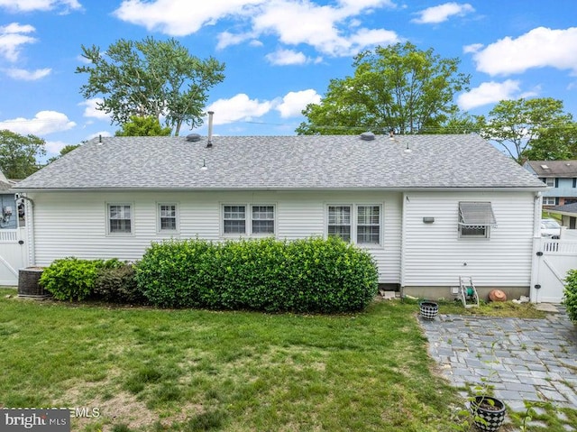 605 Oak Ter, Point Pleasant Boro, NJ 08742 - back of property featuring a gate, a shingled roof, central AC unit, and a patio area