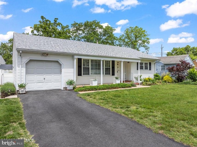 605 Oak Ter, Point Pleasant Boro, NJ 08742 - single story home featuring a garage, a front lawn, and asphalt driveway