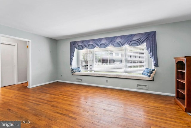 605 Oak Ter, Point Pleasant Boro, NJ 08742 - spare room featuring healthy amount of natural light, wood finished floors, and baseboards