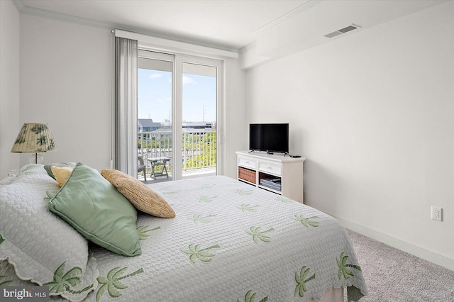 5901 Atlantic Ave Unit 411, Ocean City, MD 21842 - carpeted bedroom featuring access to outside, ornamental molding, and baseboards