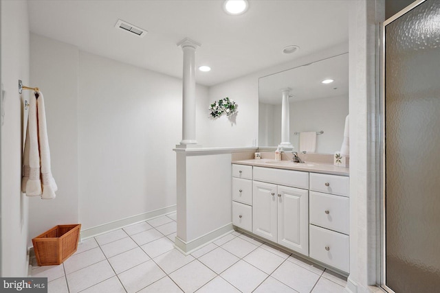 5901 Atlantic Ave Unit 411, Ocean City, MD 21842 - bathroom featuring ornate columns, vanity, tile patterned flooring, recessed lighting, and a stall shower