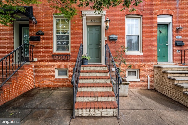 3310 Hudson St, Baltimore, MD 21224 - property entrance featuring brick siding