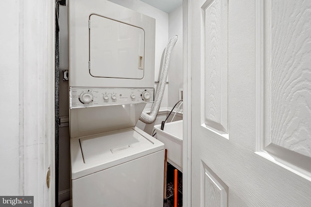 3310 Hudson St, Baltimore, MD 21224 - laundry room featuring estacked washer and dryer