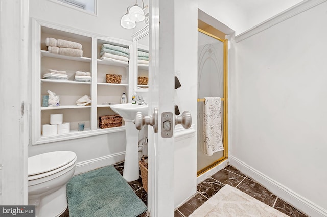 3310 Hudson St, Baltimore, MD 21224 - bathroom with marble finish floors, baseboards, toilet, and an enclosed shower