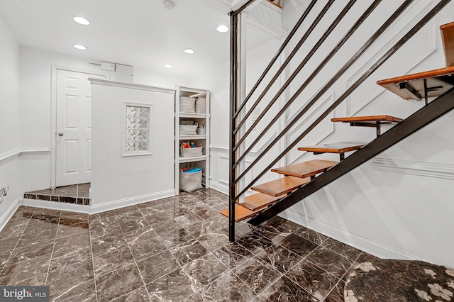 3310 Hudson St, Baltimore, MD 21224 - stairs with recessed lighting, marble finish flooring, and baseboards